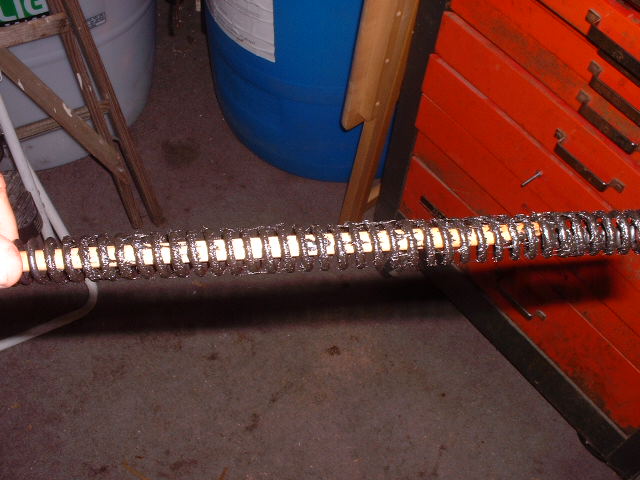 Applying heavy tar to the Maccari spring