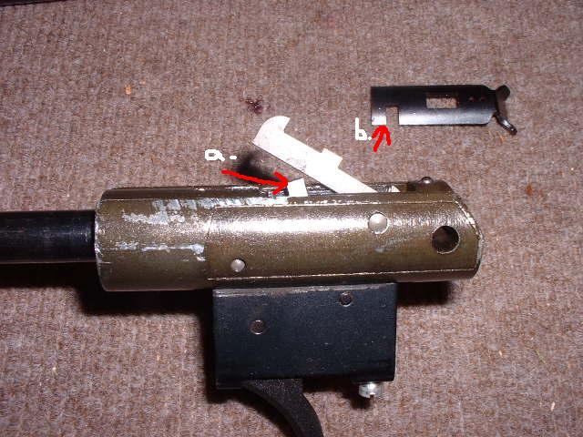 Safety arm and notch, labeled A and B