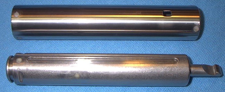 Piston and compression tube buttoned