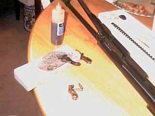 Replacement keeper and sear spring removed