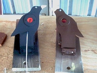 Two painted bird field targets ready to go