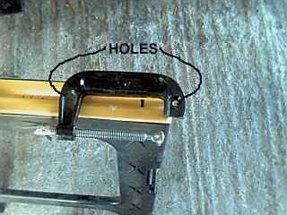Modified C-clamp with drilled holes for lag bolt mounting