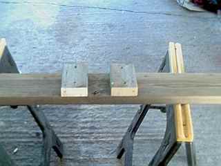 Two 2x4s placed for the barrel to rest on