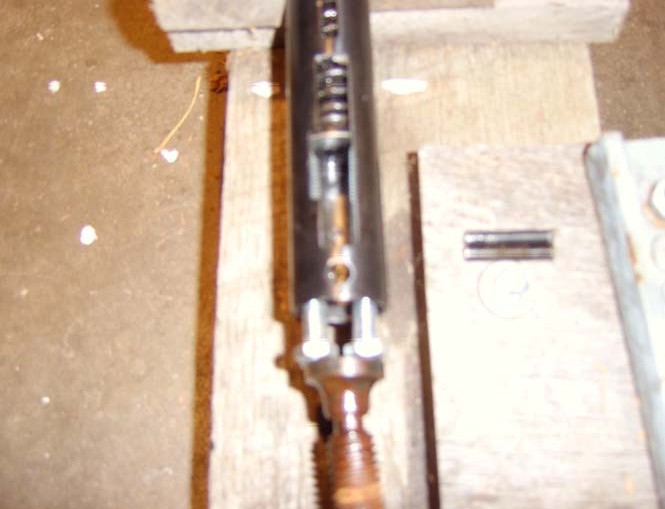 Receiver clamped in wood blocks with compressor bolts