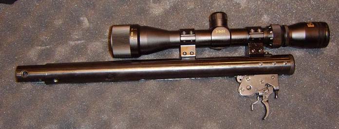 Scope and barrel assembly removed from the stock